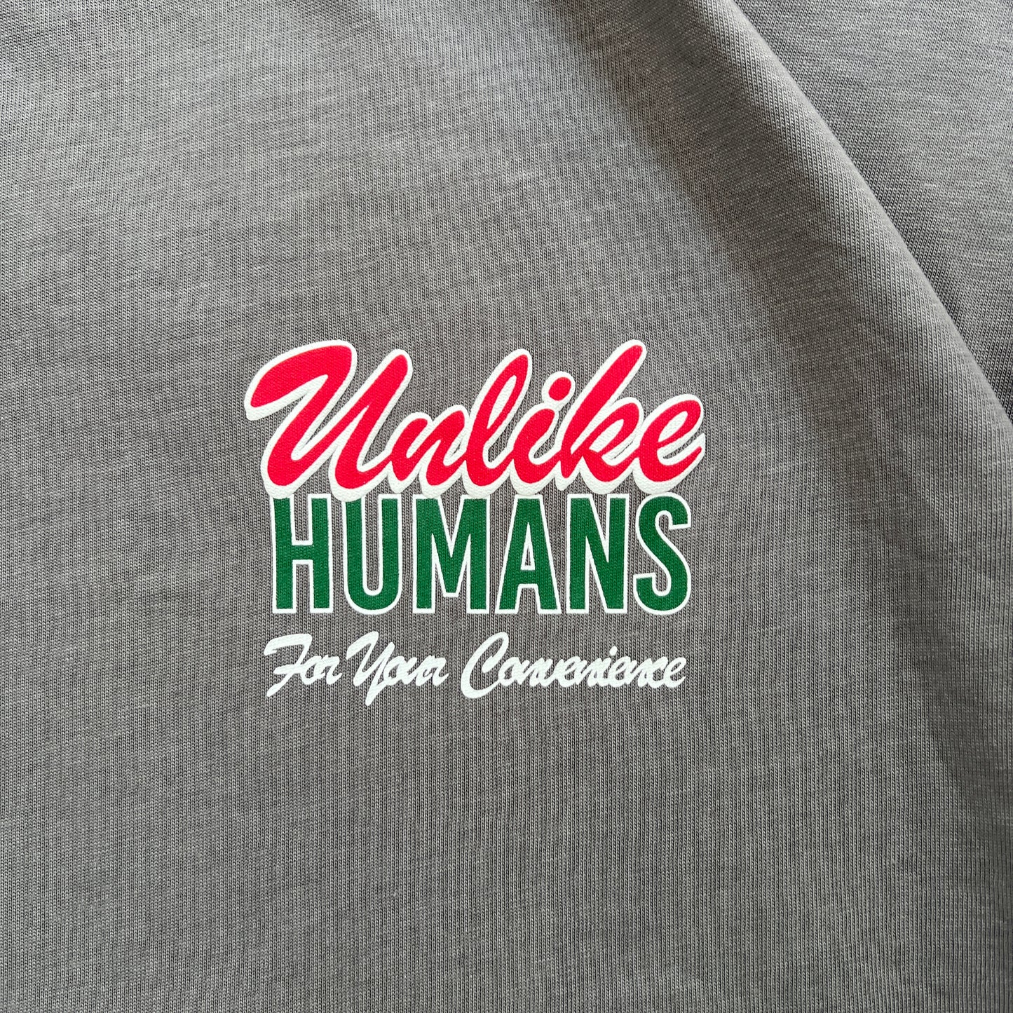Unlike Humans Graphic Tee